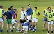 18 July 2006; Longford manager Luke Dempsey talks to his players during football training. Longford Slashers GAA Ground, Longford. Picture credit: Damien Eagers / SPORTSFILE
