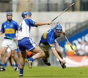 23 July 2006; John O'Brien, Tipperary, in action against Michael Walsh, Waterford. Guinness All-Ireland Senior Hurling Championship Quarter-Final, Tipperary v Waterford, Croke Park, Dublin. Picture credit: Matt Browne / SPORTSFILE