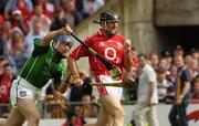 22 July 2006; Brian Corcoran, Cork, in action against Stephen Lucey, Limerick. Guinness All-Ireland Senior Hurling Championship Quarter-Final, Cork v Limerick, Semple Stadium, Thurles, Co. Tipperary. Picture credit: Damien Eagers / SPORTSFILE