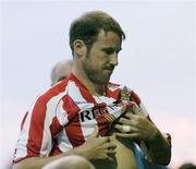 24 July 2006; Kenny Cunningham, Sunderland, puts on his jersey for his first game for his club. Pre-season Friendly, Shelbourne v Sunderland, Tolka Park, Dublin. Picture credit: David Maher / SPORTSFILE
