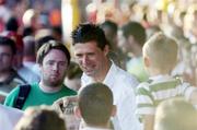 24 July 2006; Sunderland Chairman Niall Quinn is greeted by supporters before the start of the game. Pre-season Friendly, Shelbourne v Sunderland, Tolka Park, Dublin. Picture credit: David Maher / SPORTSFILE