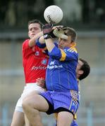 25 July 2006; Clare goalkeeper Joe Hayes and team-mate Laurence Healy in action against Shane Lennon, Louth. Tommy Murphy Cup, Round 1, Clare v Louth, Cusack Park, Ennis, Co. Clare. Picture credit: Kieran Clancy / SPORTSFILE