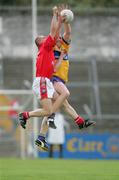 25 July 2006; Ger Quinlan, Clare, in action against Ray Finnegan, Louth. Tommy Murphy Cup, Round 1, Clare v Louth, Cusack Park, Ennis, Co. Clare. Picture credit: Kieran Clancy / SPORTSFILE