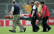 25 July 2006; Mark Stanfield, Louth, is stretchered off the field during the game. Tommy Murphy Cup, Round 1, Clare v Louth, Cusack Park, Ennis, Co. Clare. Picture credit: Kieran Clancy / SPORTSFILE