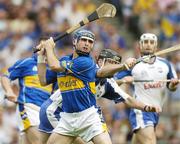 23 July 2006; Eoin Kelly, Tipperary, in action against Tom Feeney, Waterford. Guinness All-Ireland Senior Hurling Championship Quarter-Final, Tipperary v Waterford, Croke Park, Dublin. Picture credit: Matt Browne / SPORTSFILE