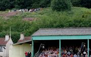27 July 2006; Supporters watch on from the stand and a vantage point over looking the Brandywell. UEFA Cup 1st Round, 2nd Leg, Derry City v IFK Gothenburg, Brandywell, Derry. Picture credit; David Maher / SPORTSFILE