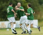 28 July 2006; Paul Dollard, centre, Republic of Ireland, celebrates with team-mates Joseph Markey, 5, Aidan Brennan, and Luke Evans, right, after scoring his side's goal. Cerebral Palsy European Soccer Championships, 3rd / 4th place play-off, Republic of Ireland v Netherlands, Belfield Bowl, UCD, Dublin. Picture credit: Brian Lawless / SPORTSFILE