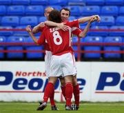 28 July 2006; Ollie Cahill, Shelbourne, celebrates with team-mates Stuart Bryne, 8 and Dave Rodgers after scoring his side's first goal. eircom League Premier Division, Shelbourne v Sligo Rovers, Tolka Park, Dublin. Picture credit; Damien Eagers / SPORTSFILE
