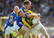 29 July 2006; Colm Cooper, Kerry, in action against Cathal Conefrey, Longford. Bank of Ireland All-Ireland Senior Football Championship Qualifier, Round 4, Kerry v Longford, Fitzgerald Stadium, Killarney, Co. Kerry. Picture credit; Brendan Moran / SPORTSFILE