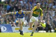 29 July 2006; Tommy Griffin, Kerry, in action against Arthur O'Connor, Longford. Bank of Ireland All-Ireland Senior Football Championship Qualifier, Round 4, Kerry v Longford, Fitzgerald Stadium, Killarney, Co. Kerry. Picture credit; Brendan Moran / SPORTSFILE