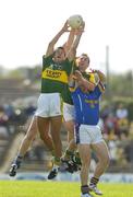 29 July 2006; Aidan O'Mahony, Kerry, supported by team-mate Darragh O Se, firlds a high ball ahead of Padraig Berry and Liam Keenan, Longford. Bank of Ireland All-Ireland Senior Football Championship Qualifier, Round 4, Kerry v Longford, Fitzgerald Stadium, Killarney, Co. Kerry. Picture credit; Brendan Moran / SPORTSFILE
