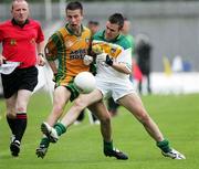 29 July 2006; Eoin Waide, Donegal, in action against Ken Casey, Offaly. ESB All-Ireland Minor Football Championship Quarter-Final, Donegal v Offaly, St Tighearnach's Park Clones, Co. Monaghan. Picture credit; Oliver McVeigh / SPORTSFILE
