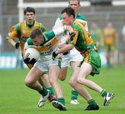 29 July 2006; Martin McElhinney, Donegal, in action against Ross Brady, Offaly. ESB All-Ireland Minor Football Championship Quarter-Final, Donegal v Offaly, St Tighearnach's Park Clones, Co. Monaghan. Picture credit; Oliver McVeigh / SPORTSFILE