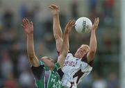 29 July 2006; Michael Donnellan, Galway, in action against Michael Ennis, Westmeath. Bank of Ireland All-Ireland Senior Football Championship Qualifier, Round 4, Galway v Westmeath, Pearse Stadium, Galway. Picture credit; David Maher / SPORTSFILE