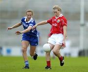 29 July 2006; Amanda Murphy, Cork, in action against Mary O'Donnell, Waterford. TG4 Ladies Munster Senior Football Final, Cork v Waterford, Gaelic Grounds, Limerick. Picture credit; Brendan Moran / SPORTSFILE