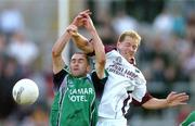 29 July 2006; Michael Donnellan, Galway, in action against Michael Ennis, Westmeath. Bank of Ireland All-Ireland Senior Football Championship Qualifier, Round 4, Galway v Westmeath, Pearse Stadium, Galway. Picture credit; David Maher / SPORTSFILE