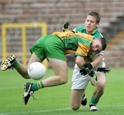 29 July 2006; Gerard Ward, Donegal, in action against Danel Hales, Offaly. ESB All-Ireland Minor Football Championship Quarter-Final, Donegal v Offaly, St Tighearnach's Park Clones, Co. Monaghan. Picture credit; Oliver McVeigh / SPORTSFILE
