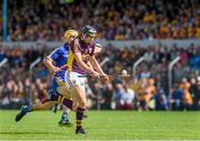 5 July 2014; Liam Óg McGovern, Wexford, is tackled by Colm Galvin, Clare. GAA Hurling All-Ireland Senior Championship, Round 1, Clare v Wexford, Cusack Park, Ennis, Co. Clare. Picture credit: Ray McManus / SPORTSFILE
