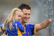 5 July 2014; Wicklow supporter Padraig Hyland, and his daughter Anna, watch his brother Ciaran in action against Sligo. GAA Football All Ireland Senior Championship, Round 2A, Wicklow v Sligo, County Grounds, Aughrim, Co. Wicklow. Picture credit: Matt Browne / SPORTSFILE