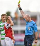 5 July 2014; Conor McCormack, St Patrick's Athletic, is shown a yellow card by referee Padraig Sutton. SSE Airtricity League Premier Division. Shamrock Rovers v St Patrick's Athletic. Tallaght Stadium, Tallaght, Co. Dublin. Picture credit: Barry Cregg / SPORTSFILE