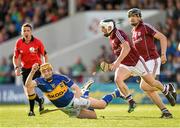 5 July 2014; Lar Corbett, Tipperary, in action against Andrew Smith, Galway. GAA Hurling All Ireland Senior Championship, Round 1, Tipperary v Galway. Semple Stadium, Thurles, Co. Tipperary. Picture credit: Stephen McCarthy / SPORTSFILE