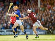 5 July 2014; Lar Corbett, Tipperary, in action against Andrew Smith, Galway. GAA Hurling All Ireland Senior Championship, Round 1, Tipperary v Galway. Semple Stadium, Thurles, Co. Tipperary. Picture credit: Stephen McCarthy / SPORTSFILE