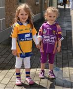 5 July 2014; Three year old cousins Kate Walsh, from Clarecastle, Co Clare, and Aoife Walsh, Enniscorthy, Co Wexford, on their way to the game. GAA Hurling All-Ireland Senior Championship, Round 1, Clare v Wexford, Cusack Park, Ennis, Co. Clare. Picture credit: Ray McManus / SPORTSFILE