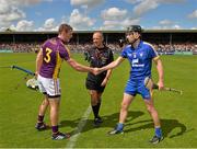5 July 2014; The Clare captain Patrick Donnellan with match referee Cathal McAllister and Wexford captain David McInerney before the game. GAA Hurling All-Ireland Senior Championship, Round 1, Clare v Wexford, Cusack Park, Ennis, Co. Clare. Picture credit: Ray McManus / SPORTSFILE
