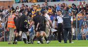 5 July 2014; Clare's Louis Mulqueen and Davy Fitzgerald appear to speak in the direction of referee Cathal McAllister at the end of the first half. GAA Hurling All-Ireland Senior Championship, Round 1, Clare v Wexford, Cusack Park, Ennis, Co. Clare. Picture credit: Ray McManus / SPORTSFILE