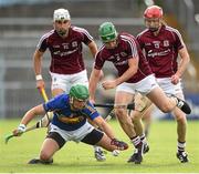 5 July 2014; James Barry, Tipperary, in action against Galway players, from left, Jason Flynn, David Burke and Cathal Mannion. GAA Hurling All Ireland Senior Championship, Round 1, Tipperary v Galway. Semple Stadium, Thurles, Co. Tipperary. Picture credit: Stephen McCarthy / SPORTSFILE