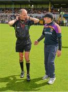 5 July 2014; The Wexford manager Liam Dunne with match referee Cathal McAllister before the game. GAA Hurling All-Ireland Senior Championship, Round 1, Clare v Wexford, Cusack Park, Ennis, Co. Clare. Picture credit: Ray McManus / SPORTSFILE