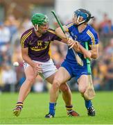 5 July 2014; David McInerney, Clare, in action against Conor McDonald, Wexford. GAA Hurling All-Ireland Senior Championship, Round 1, Clare v Wexford, Cusack Park, Ennis, Co. Clare. Picture credit: Ray McManus / SPORTSFILE
