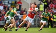 6 July 2014; Michael Desmond, Cork, in action against Kerry players, from left, Brian Sugrue, Liam Kearney and Cormac Coffey. Electric Ireland Munster GAA Football Minor Championship Final, Cork v Kerry, Páirc Ui Chaoimh, Cork. Picture credit: Brendan Moran / SPORTSFILE