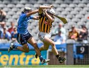 6 July 2014; Liam Blanchfield, Kilkenny, goes past the challenge of Dublin's Jake Malone on his way to scoring his side's first goal. Electric Ireland Leinster GAA Hurling Minor Championship Final, Kilkenny v Dublin, Croke Park, Dublin. Picture credit: Pat Murphy / SPORTSFILE