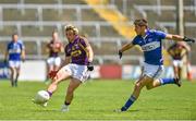 6 July 2014; Ben Brosnan, Wexford, in action against Colm Begley, Laois. GAA Football All Ireland Senior Championship, Round 2A, Wexford v Laois, Wexford Park, Wexford. Picture credit: Barry Cregg / SPORTSFILE
