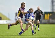 6 July 2014; Damien O'Connor, Laois, in action against Brian Malone, Wexford.  GAA Football All Ireland Senior Championship, Round 2a, Wexford v Laois, Wexford Park, Wexford. Picture credit: Barry Cregg / SPORTSFILE