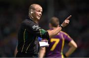 6 July 2014; Referee Anthony Nolan speaks to Michael Furlong, Wexford, before he gives him a yellow card.  GAA Football All Ireland Senior Championship, Round 2a, Wexford v Laois, Wexford Park, Wexford. Picture credit: Barry Cregg / SPORTSFILE