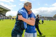 6 July 2014; Laois manager Tomás Ó Flatharta celebrates victory with John O'Loughlin after the game.  GAA Football All Ireland Senior Championship, Round 2A, Wexford v Laois, Wexford Park, Wexford. Picture credit: Barry Cregg / SPORTSFILE