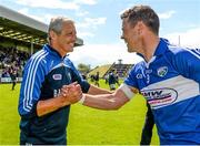 6 July 2014; Laois manager Tomás Ó Flatharta celebrates victory with John O'Loughlin after the game.  GAA Football All Ireland Senior Championship, Round 2a, Wexford v Laois, Wexford Park, Wexford. Picture credit: Barry Cregg / SPORTSFILE