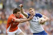 6 July 2014; Kieran Hughes, Monaghan, in action against Charlie Vernon, Armagh. Ulster GAA Football Senior Championship, Semi-Final Replay, Armagh v Monaghan, St Tiernach's Park, Clones, Co. Monaghan. Picture credit: Piaras Ó Mídheach / SPORTSFILE