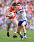 6 July 2014; Charlie Vernon, Armagh, in action against Darren Hughes, Monaghan. Ulster GAA Football Senior Championship, Semi-Final Replay, Armagh v Monaghan, St Tiernach's Park, Clones, Co. Monaghan. Picture credit: Ramsey Cardy / SPORTSFILE
