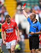 6 July 2014; John Hayes, Cork, is shown a red card by referee Cormac Reilly. Munster GAA Football Senior Championship Final, Cork v Kerry, Páirc Ui Chaoimh, Cork. Picture credit: Brendan Moran / SPORTSFILE