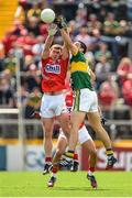 6 July 2014; Fintan Goold, Cork, contests a kick out with Anthony Maher, Kerry. Munster GAA Football Senior Championship Final, Cork v Kerry, Páirc Ui Chaoimh, Cork. Picture credit: Brendan Moran / SPORTSFILE