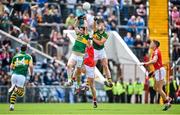 6 July 2014; Bryan Sheehan, left, and Anthony Maher, Kerry, contest a kick out with Fintan Goold, Cork, as Declan O'Sullivan, Kerry, and Aidan Walsh, Cork, await the break. Munster GAA Football Senior Championship Final, Cork v Kerry, Páirc Ui Chaoimh, Cork. Picture credit: Brendan Moran / SPORTSFILE
