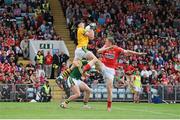 6 July 2014; Kerry goalkeeper Brian Kelly makes a save from Colm O'Neill, Cork, and Marc O Se, Kerry, during the second half. Munster GAA Football Senior Championship Final, Cork v Kerry, Páirc Ui Chaoimh, Cork. Picture credit: Evan Maher / SPORTSFILE