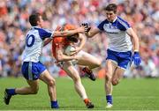 6 July 2014; Charlie Vernon, Armagh, in action against Ryan Wylie, left, and Darren Hughes, Monaghan. Ulster GAA Football Senior Championship, Semi-Final Replay, Armagh v Monaghan, St Tiernach's Park, Clones, Co. Monaghan. Picture credit: Ramsey Cardy / SPORTSFILE