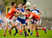 6 July 2014; Conor McManus, Monaghan, in action against Aidan Forker, left, and Tony Kernan, Armagh. Ulster GAA Football Senior Championship, Semi-Final Replay, Armagh v Monaghan, St Tiernach's Park, Clones, Co. Monaghan. Picture credit: Piaras Ó Mídheach / SPORTSFILE