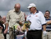 24 July 2006; Two time Major winner John Daly in conversation with Cork hurler Brian Corcoran at the opening of the Blarney Golf Resort, Blarney, Co. Cork. The 50 million euro complex on a magnificent 164 acre site, has as it's centrepiece, a John Daly designed championship course and also comprises a 62 bedroom Ramada Hotel, 56 luxury self catering suites and the Sentosa Spa. This is the first course in Europe to be designed by John Daly. Picture credit: Brendan Moran / SPORTSFILE