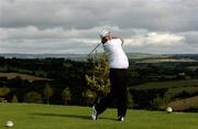 24 July 2006; Two time Major winner John Daly drives off at the 8th tee box during the opening of the Blarney Golf Resort, Blarney, Co. Cork. The 50 million euro complex on a magnificent 164 acre site, has as it's centrepiece, a John Daly designed championship course and also comprises a 62 bedroom Ramada Hotel, 56 luxury self catering suites and the Sentosa Spa. This is the first course in Europe to be designed by John Daly. Picture credit: Brendan Moran / SPORTSFILE
