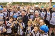 28 July 2006; The Vhi Cul Camps, the official GAA summer camps, got off to a flying start all around the country at the start of July and are now in full swing with up to 75,000 children expected to attend the camps nationwide between July 3rd and 25th August. Pictured at the camp in Bagenalstown, Co. Carlow, are, GAA President Nickey Brennan and Tony McSweeney, Director of Corporate Business , VHI Healthcare with some of the kids woh a attended the camp. Bagenalstown, Co. Carlow. Picture credit; Matt Browne / SPORTSFILE